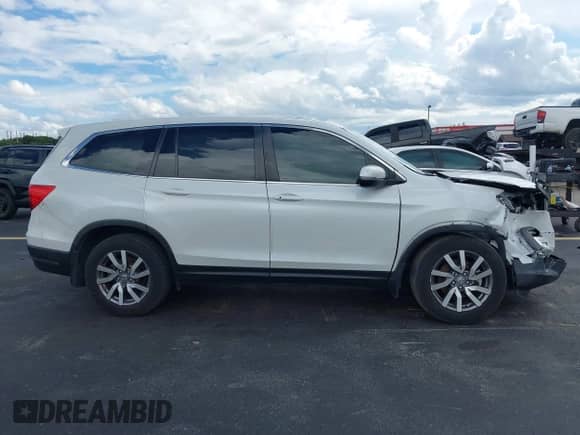 2022 Honda Pilot EX-L z VIN 5FNYF5H54NB011381, wystawiony jako IAAI lot #43385136 z przebiegiem 44 586 mil mil oraz . Historia ofert i sprzedaży dostępna na DreamBid. Obrazek 13.