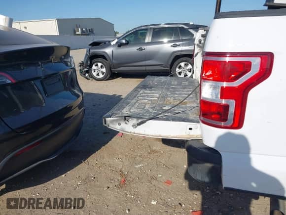 2019 Ford F-150 XL with VIN 1FTMF1CBXKKD47748, listed as a IAAI auction lot 41983277 with 120,933 mi miles and . Bid and sale history available at DreamBid. Image 18.