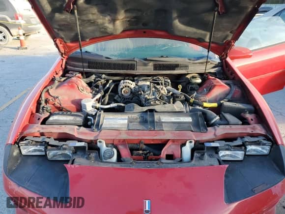 1997 Chevrolet Camaro RS z VIN 2G1FP22K2V2105251, wystawiony jako Copart lot #75874114 z przebiegiem 113 820 mil mil oraz Czysty tytuł • Clean title. Historia ofert i sprzedaży dostępna na DreamBid. Obrazek 11.