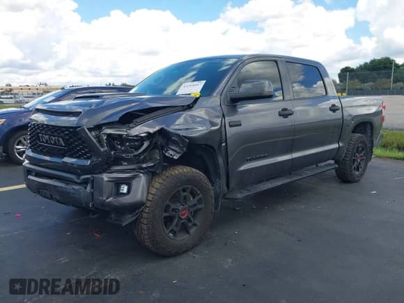 2021 Toyota Tundra SR5 with VIN 5TFDY5F19MX995527, listed as a IAAI auction lot 43314607 with 22,874 mi miles and . Bid and sale history available at DreamBid. Image 2.