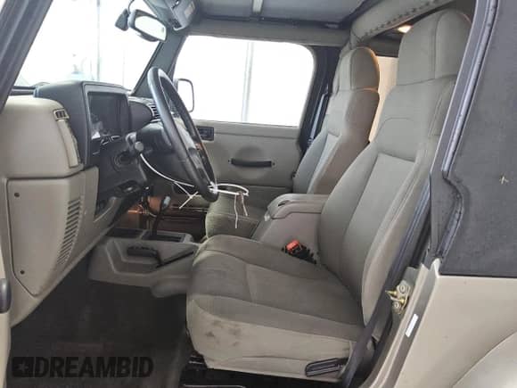 2003 Jeep Wrangler Sahara с VIN 1J4FA59S33P363830, выставлен на аукционе Copart как лот 62773325 с пробегом 114 286 миль миль и Чистый • Clean title. История ставок и продаж доступна на DreamBid. Изображение 7.