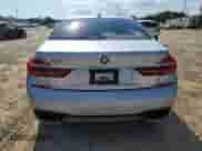 2018 BMW 7 Series 750i with VIN WBA7F0C5XJGM23968, listed as a Copart auction lot 71518115 with 64,569 mi miles and Salvage title. Bid and sale history available at DreamBid. Image 6.