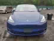 2024 Tesla Model Y Long Range with VIN 7SAYGDEE4RF986774, listed as a Copart auction lot 89833295 with 3,503 mi miles and Salvage title. Bid and sale history available at DreamBid. Image 5.