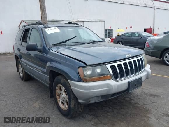 2002 Jeep Grand Cherokee Sport with VIN 1J4GW38S52C160021, listed as a IAAI auction lot 42207688 with 132,956 mi miles and . Bid and sale history available at DreamBid. Image 1.