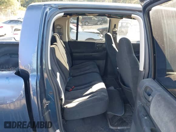 2004 Dodge Dakota SLT with VIN 1D7HG48N34S737294, listed as a IAAI auction lot 43498525 with 189,980 mi miles and . Bid and sale history available at DreamBid. Image 8.
