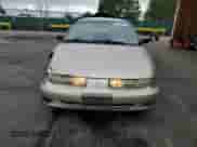 1999 Saturn SL z VIN 1G8ZK5278XZ335628, wystawiony jako Copart lot #80563955 z przebiegiem 185 590 mil mil oraz Szkoda całkowita • Salvage title. Historia ofert i sprzedaży dostępna na DreamBid. Obrazek 5.
