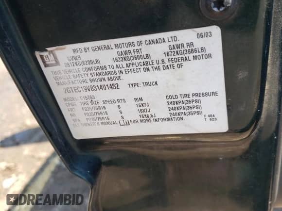 2003 GMC Sierra 1500 SLE with VIN 2GTEC19V831401452, listed as a Copart auction lot 69661575 with 302,718 mi miles and Salvage title. Bid and sale history available at DreamBid. Image 12.