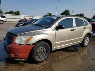 2009 Dodge Caliber SE with VIN 1B3HB28A99D151772, listed as a Copart auction lot 66681595 with 189,648 mi miles and Salvage title. Bid and sale history available at DreamBid. Image 1.