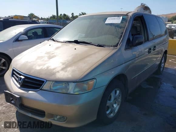 2002 Honda Odyssey LX with VIN 2HKRL18582H513684, listed as a IAAI auction lot 43008160 with 320,191 mi miles and . Bid and sale history available at DreamBid. Image 2.