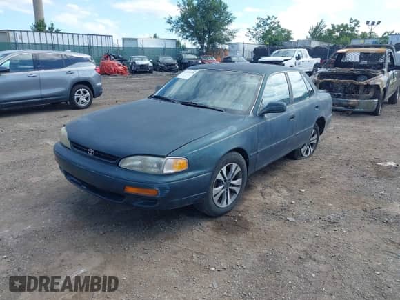 1996 Toyota Camry LE z VIN 4T1BF12K0TU864969, wystawiony jako IAAI lot #43022058 z przebiegiem 166 721 mil mil oraz . Historia ofert i sprzedaży dostępna na DreamBid. Obrazek 17.