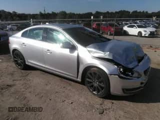 2018 Volvo S60 Inscription z VIN LYV402TK0JB165559, wystawiony jako IAAI lot #42439213 z przebiegiem 67 730 mil mil oraz . Historia ofert i sprzedaży dostępna na DreamBid. Obrazek 1.