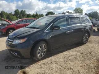 2015 Honda Odyssey Touring Elite z VIN 5FNRL5H95FB052149, wystawiony jako Copart lot #71604495 z przebiegiem 180 653 mil mil oraz Szkoda całkowita • Salvage title. Historia ofert i sprzedaży dostępna na DreamBid. Obrazek 1.