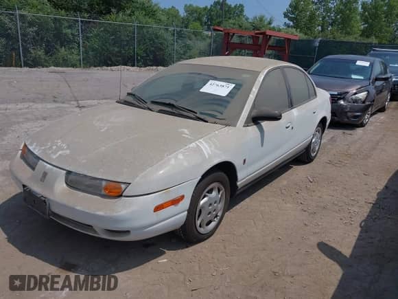 2002 Saturn SL with VIN 1G8ZK52772Z218812, listed as a IAAI auction lot 42763871 with 86,338 mi miles and . Bid and sale history available at DreamBid. Image 2.