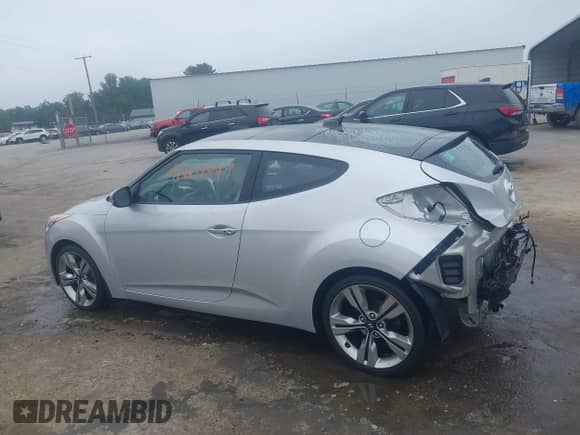 2012 Hyundai Veloster w/Black Int с VIN KMHTC6AD1CU034787, выставлен на аукционе IAAI как лот 42607847 с пробегом 126 912 миль миль и . История ставок и продаж доступна на DreamBid. Изображение 15.