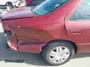 2000 Toyota Camry LE z VIN 4T1BF28K0YU938704, wystawiony jako IAAI lot #43512423 z przebiegiem 148 882 mil mil oraz . Historia ofert i sprzedaży dostępna na DreamBid. Obrazek 6.