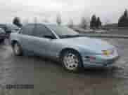2002 Saturn SL with VIN 1G8ZK52772Z290447, listed as a Copart auction lot 68545105 with 183,346 mi miles and Salvage title. Bid and sale history available at DreamBid. Image 4.