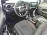 2023 Jeep Wrangler Sport with VIN 1C4GJXAN2PW503714, listed as a Copart auction lot 68881374 with 25,506 mi miles and Salvage title. Bid and sale history available at DreamBid. Image 8.