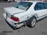 1998 BMW 7 Series 740iL with VIN WBAGJ8328WDM15945, listed as a IAAI auction lot 42809205 with 239,449 mi miles and . Bid and sale history available at DreamBid. Image 6.