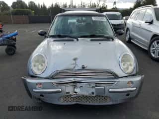 2002 MINI Hardtop with VIN WMWRC33422TC32681, listed as a Copart auction lot 52005995 with 110,228 mi miles and Salvage title. Bid and sale history available at DreamBid. Image 5.