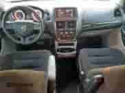 2014 Dodge Grand Caravan SXT with VIN 2C4RDGCG5ER477307, listed as a Copart auction lot 84047895 with 152,010 mi miles and Salvage title. Bid and sale history available at DreamBid. Image 8.