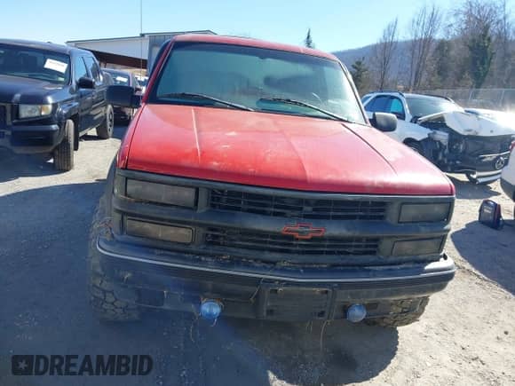 1999 Chevrolet Tahoe z VIN 3GNEK18R7XG189820, wystawiony jako IAAI lot #41631906 z przebiegiem 212 720 mil mil oraz . Historia ofert i sprzedaży dostępna na DreamBid. Obrazek 13.