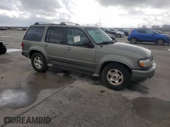 2000 Ford Explorer with VIN 1FMDU65P9YUB42443, listed as a Copart auction lot 70036074 with 175,479 mi miles and Salvage title. Bid and sale history available at DreamBid. Image 4.