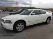 2007 Dodge Charger R/T with VIN 2B3LK53H67H785637, listed as a Copart auction lot 82338964 with 154,058 mi miles and Salvage title. Bid and sale history available at DreamBid. Image 1.