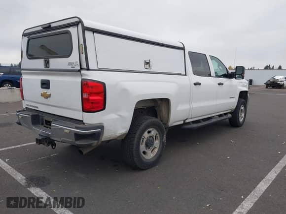 2019 Chevrolet Silverado 2500HD Work Truck z VIN 1GC1KREG3KF188506, wystawiony jako IAAI lot #43557496 z przebiegiem 97 430 mil mil oraz . Historia ofert i sprzedaży dostępna na DreamBid. Obrazek 4.