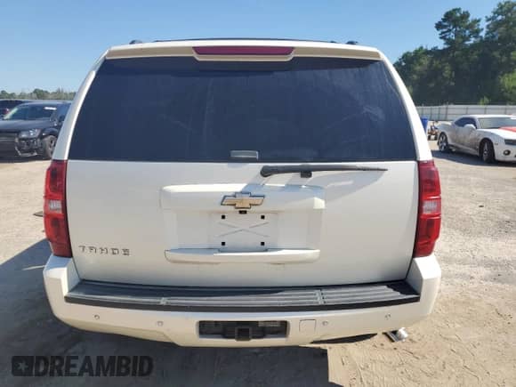 2008 Chevrolet Tahoe LTZ с VIN 1GNFC13J18R238238, выставлен на аукционе Copart как лот 70497305 с пробегом Не указан миль и Списание • Salvage title. История ставок и продаж доступна на DreamBid. Изображение 6.
