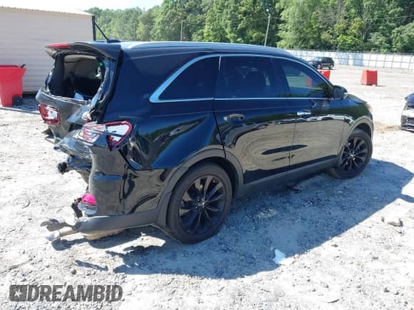 2020 Kia Sorento EX with VIN 5XYPH4A51LG659857, listed as a IAAI auction lot 42711203 with 74,336 mi miles and . Bid and sale history available at DreamBid. Image 4.