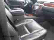 2014 Chevrolet Tahoe LTZ with VIN 1GNSKCE07ER142112, listed as a IAAI auction lot 41870089 with 168,575 mi miles and . Bid and sale history available at DreamBid. Image 5.