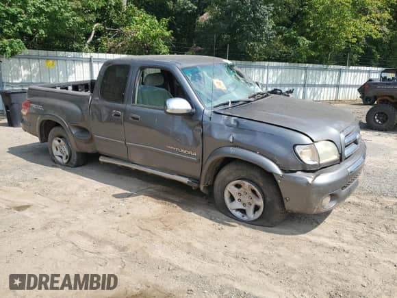2004 Toyota Tundra SR5 z VIN 5TBRT34134S443967, wystawiony jako Copart lot #68913605 z przebiegiem Nie podano mil oraz Szkoda całkowita • Salvage title. Historia ofert i sprzedaży dostępna na DreamBid. Obrazek 4.