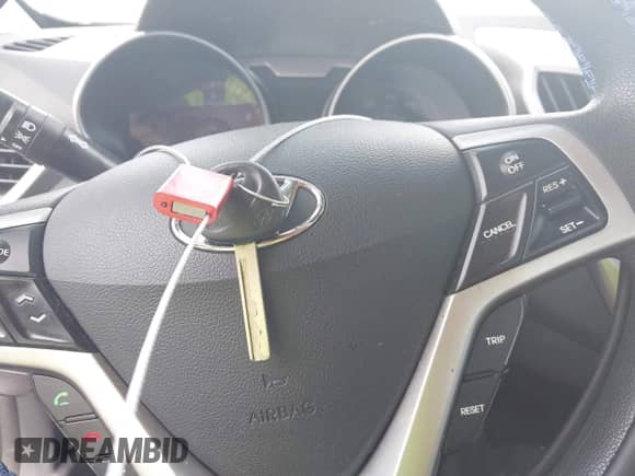 2012 Hyundai Veloster w/Black Int с VIN KMHTC6AD7CU042053, выставлен на аукционе IAAI как лот 42785973 с пробегом 164 030 миль миль и . История ставок и продаж доступна на DreamBid. Изображение 11.