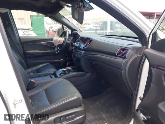 2021 Honda Passport EX-L with VIN 5FNYF7H59MB001083, listed as a IAAI auction lot 42943781 with 56,549 mi miles and . Bid and sale history available at DreamBid. Image 5.