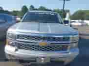 2014 Chevrolet Silverado 1500 LT with VIN 3GCPCREHXEG259073, listed as a IAAI auction lot 43010013 with 128,000 mi miles and . Bid and sale history available at DreamBid. Image 12.