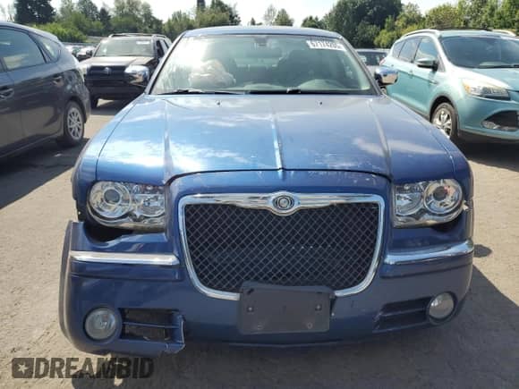 2009 Chrysler 300 C Hemi with VIN 2C3KA63T99H615464, listed as a Copart auction lot 67174205 with 75,111 mi miles and Salvage title. Bid and sale history available at DreamBid. Image 5.