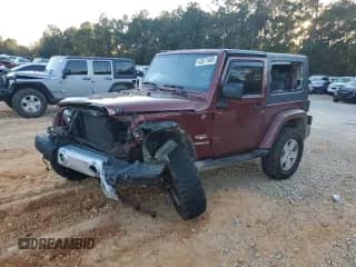 2009 Jeep Wrangler Sahara z VIN 1J4FA54159L742097, wystawiony jako Copart lot #43571465 z przebiegiem 98 244 mil mil oraz Szkoda całkowita • Salvage title. Historia ofert i sprzedaży dostępna na DreamBid. Obrazek 1.