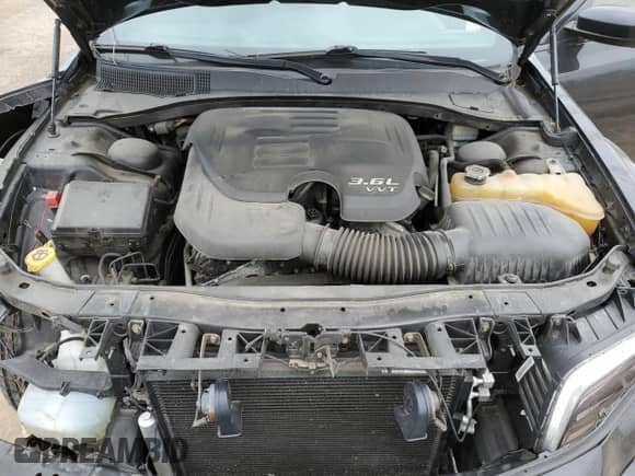 2014 Chrysler 300 z VIN 2C3CCARG8EH305991, wystawiony jako Copart lot #55731665 z przebiegiem 138 801 mil mil oraz Szkoda całkowita • Salvage title. Historia ofert i sprzedaży dostępna na DreamBid. Obrazek 11.