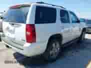 2012 Chevrolet Tahoe LT with VIN 1GNSCBE04CR102302, listed as a IAAI auction lot 43202041 with 212,653 mi miles and . Bid and sale history available at DreamBid. Image 4.
