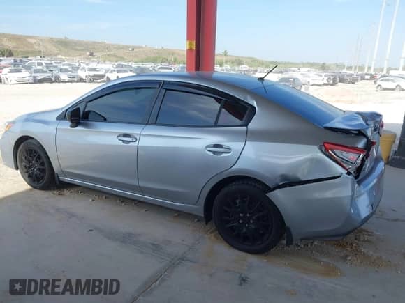 2017 Subaru Impreza with VIN 4S3GKAA61H3617452, listed as a IAAI auction lot 42115262 with 165,836 mi miles and . Bid and sale history available at DreamBid. Image 14.