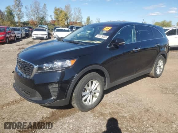 2019 Kia Sorento LX with VIN 5XYPG4A37KG575865, listed as a Copart auction lot 82275785 with 117,297 mi miles and Clean title. Bid and sale history available at DreamBid. Image 1.
