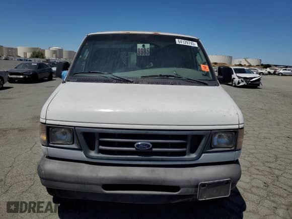 2003 Ford Econoline Cargo с VIN 1FTRE14293HA13605, выставлен на аукционе Copart как лот 64129745 с пробегом 256 829 миль миль и Списание • Salvage title. История ставок и продаж доступна на DreamBid. Изображение 5.