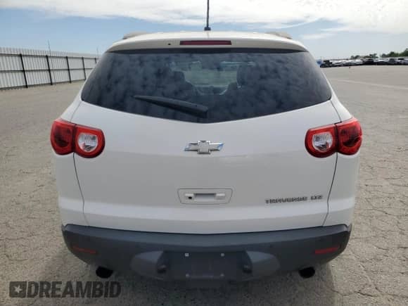 2012 Chevrolet Traverse LTZ с VIN 1GNKRLED0CJ343117, выставлен на аукционе Copart как лот 85080195 с пробегом 158 994 миль миль и Чистый • Clean title. История ставок и продаж доступна на DreamBid. Изображение 6.