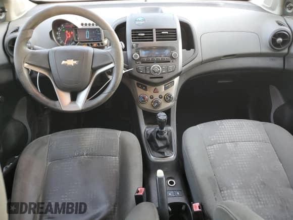 2012 Chevrolet Sonic LS with VIN 1G1JB6SH0C4176718, listed as a Copart auction lot 42645785 with 127,032 mi miles and Salvage title. Bid and sale history available at DreamBid. Image 8.