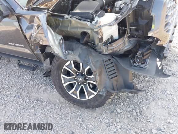 2021 Toyota Tacoma SR with VIN 3TYCZ5AN0MT027247, listed as a IAAI auction lot 43234020 with 26,058 mi miles and . Bid and sale history available at DreamBid. Image 6.