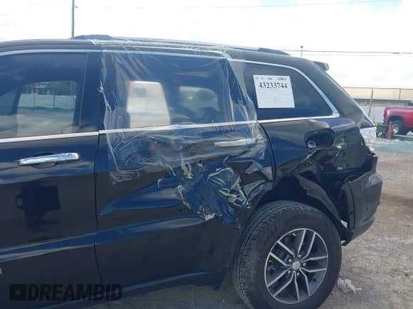 2018 Jeep Grand Cherokee Sterling with VIN 1C4RJEBGXJC339182, listed as a IAAI auction lot 43233744 with 80,453 mi miles and . Bid and sale history available at DreamBid. Image 6.