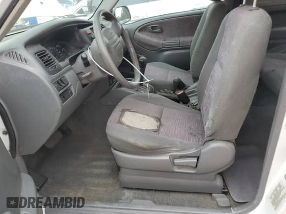 1999 Chevrolet Tracker z VIN 2CNBJ18C4X6936825, wystawiony jako Copart lot #56014565 z przebiegiem 120 978 mil mil oraz Szkoda całkowita • Salvage title. Historia ofert i sprzedaży dostępna na DreamBid. Obrazek 7.