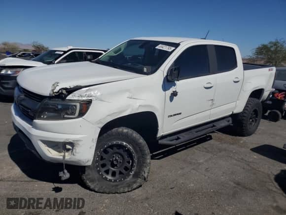 2019 Chevrolet Colorado 2WD Z71 with VIN 1GCGSDEN6K1349228, listed as a Copart auction lot 65421795 with 75,599 mi miles and Salvage title. Bid and sale history available at DreamBid. Image 1.