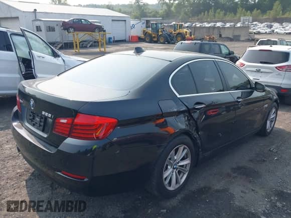 2016 BMW 5 Series 528i xDrive with VIN WBA5A7C55GG148999, listed as a IAAI auction lot 42931192 with 157,996 mi miles and . Bid and sale history available at DreamBid. Image 4.