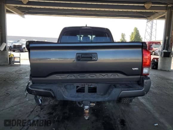 2016 Toyota Tacoma SR5 z VIN 3TMDZ5BN5GM010494, wystawiony jako Copart lot #80669725 z przebiegiem 70 504 mil mil oraz Szkoda całkowita • Salvage title. Historia ofert i sprzedaży dostępna na DreamBid. Obrazek 6.